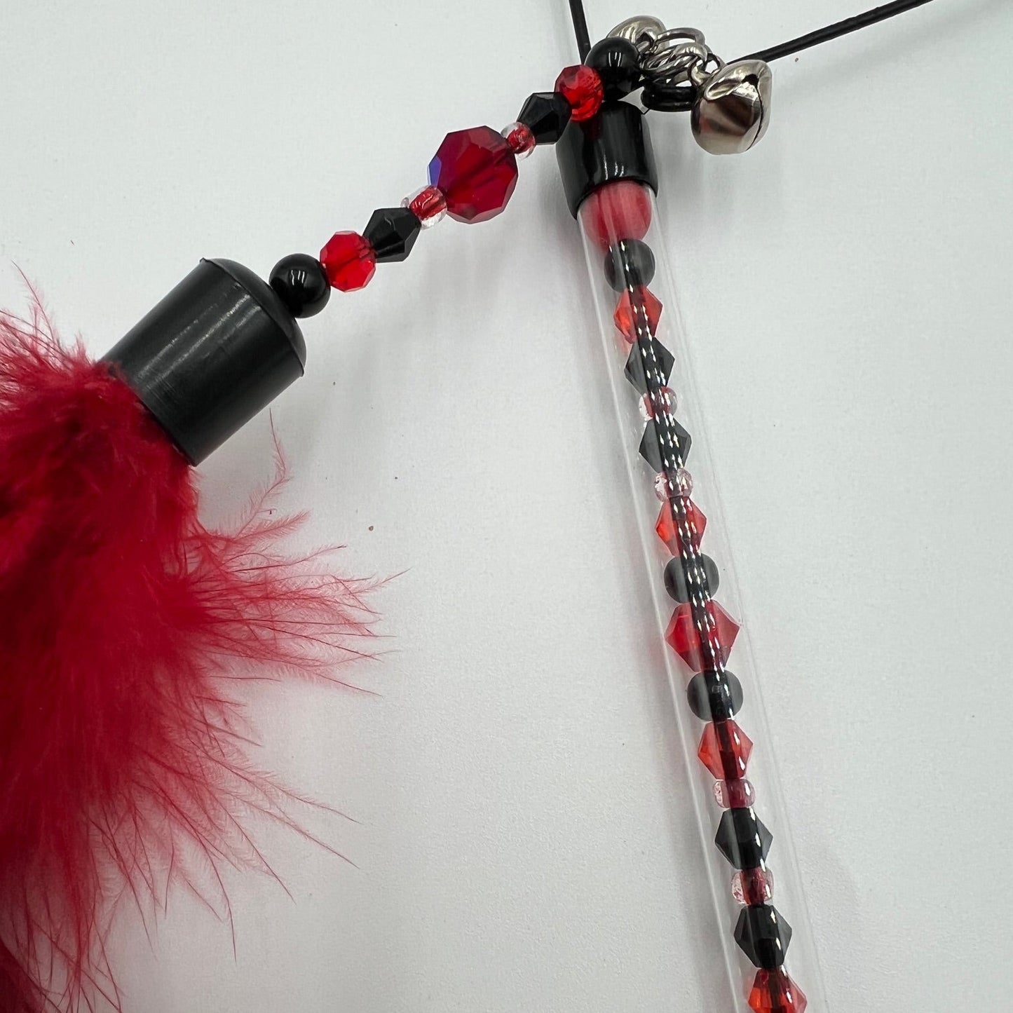 PLUMEAU SWING - Noir & rouge